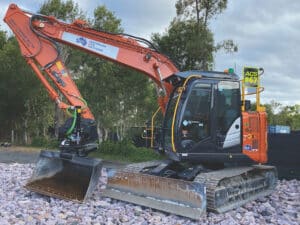 An excavator equipped with a Steelwrist tiltrotator