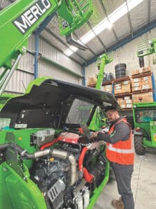Merlo Group Australia's John Pham working on a Merlo telehandler
