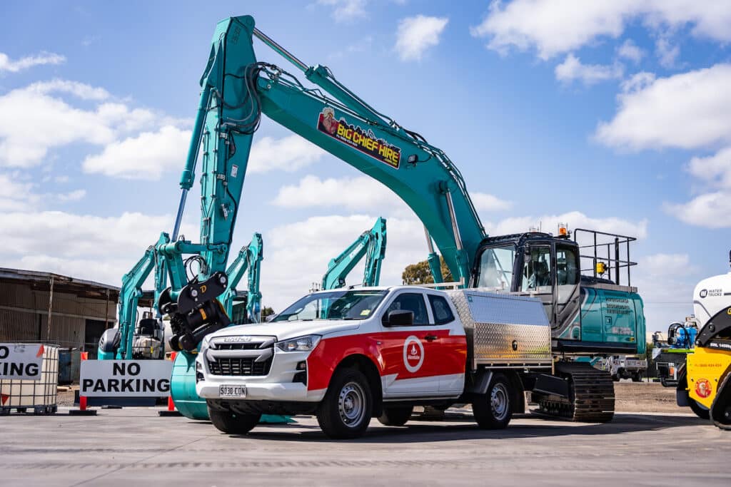 An Alemlube service vehicle in front of one of Big Chief Hire's Kobelco excavators